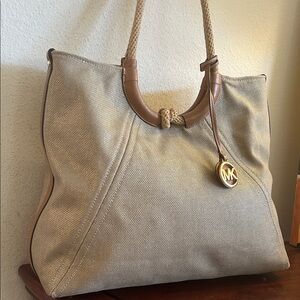 Michael Kors Beige Canvas Tote with Tan Leather Trim and Gold MK Charm